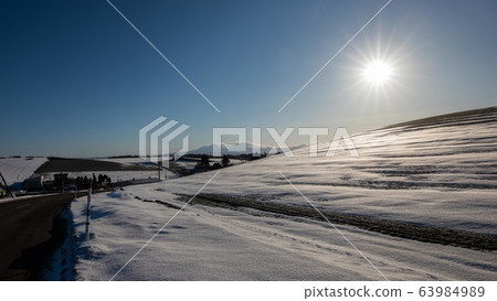 March Biei is melting snow 63984989