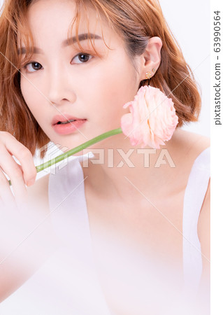 Young woman beauty flower 63990564
