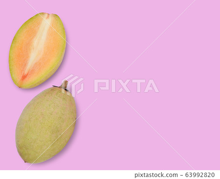 sapodilla fruit top view on pink background sapodilla fruit top view on pink background 63992820