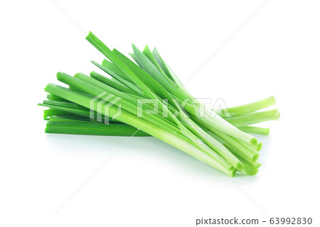 green onion chives on white background. 63992830