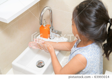 Washing hands child rinsing soap with running Washing hands child rinsing soap with running 63993014