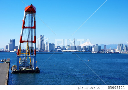 Crane vessel and Mt. Fuji over Yokohama Minatomirai Crane vessel and Mt. Fuji over Yokohama Minatomirai 63993121