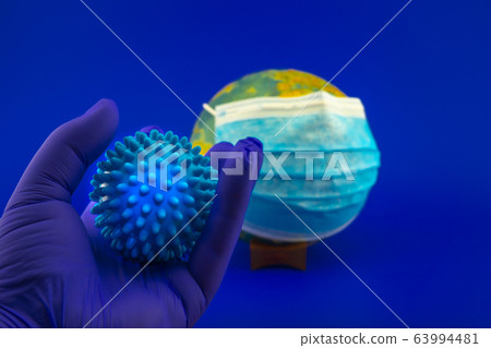 Pandemic concept with virus molecule and globe Pandemic concept with virus molecule and globe 63994481