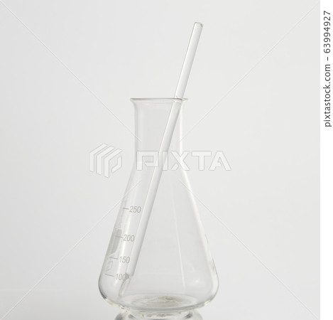 Close-Up Of Flask Against White Background 63994927