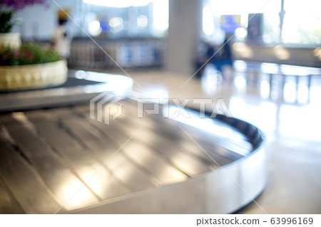Blur view of bag claim belt Blur view of bag claim belt 63996169