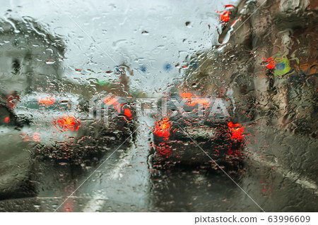 Through the wet glass. 63996609