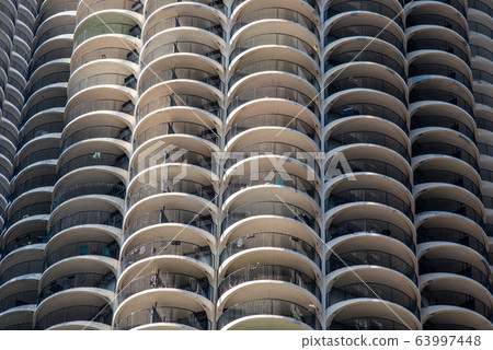Marina City along the river in Chicago 63997448