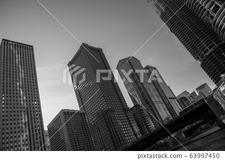 Skyscrapers along the river in Chicago Skyscrapers along the river in Chicago 63997450