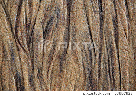 Wet sea sandstone with traces of groundwater 63997925