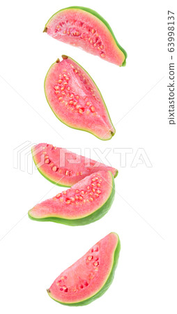 Guava pieces in the air 63998137