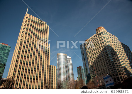 Skyscrapers along the river in Chicago Skyscrapers along the river in Chicago 63998871