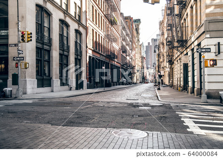 Empty street at sunset time in SoHo district in Manhattan, New York Empty street at sunset time in SoHo district in Manhattan, New York 64000084