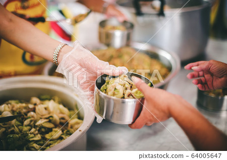 Helping the poor with free food to alleviate Helping the poor with free food to alleviate 64005647