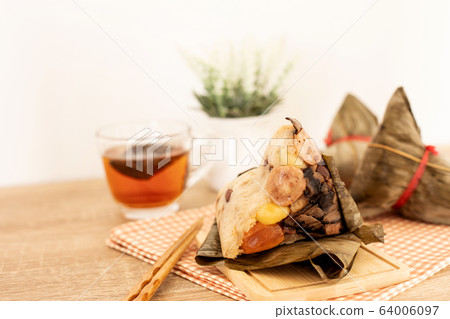 Close up Zongzi or rice dumpling on the wooden 64006097