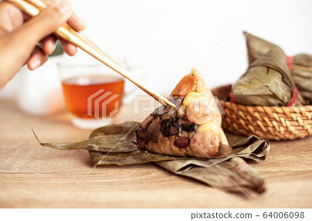 Close up Zongzi or rice dumpling on the wooden 64006098