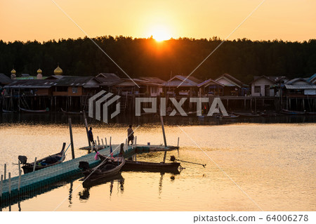 Fisherman village and musque at sunset, Phang Nga 64006278