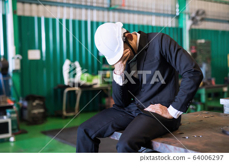 Cry factory businessman due to covid-19 global Cry factory businessman due to covid-19 global 64006297