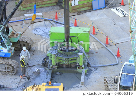 Construction site foundation work 64006319