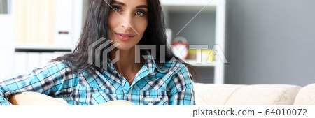 Lovely woman posing in studio Lovely woman posing in studio 64010072