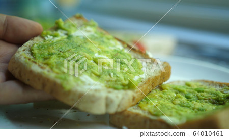 Healthy avocado toasts for breakfast or lunch Healthy avocado toasts for breakfast or lunch 64010461