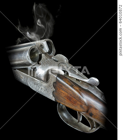 Hunting rifle on a black background 64010872