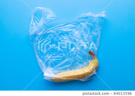 Plastic pollution, fresh banana in plastic bag Plastic pollution, fresh banana in plastic bag 64013596