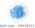 Medical respiratory mask protection against coronavirus. Covid-19 virus safety blue masks isolated on white background. Surgical hygienics bandage face. Antiviral infection mask with clipping path 64018231