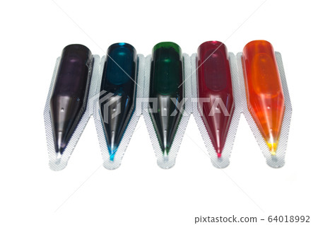 Closeup of food coloring palette on white 64018992