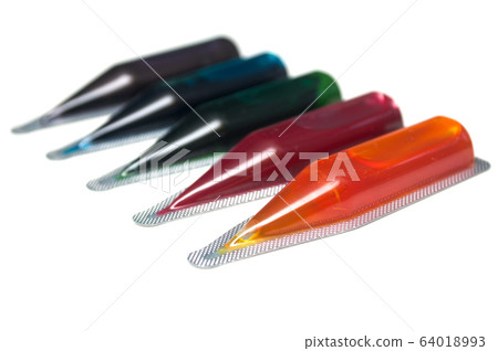 Closeup of food coloring palette on white Closeup of food coloring palette on white 64018993