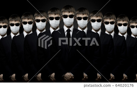 man in black costume in medical mask 64020176