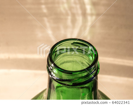 Green bottle neck in close up. Green bottle neck in close up. 64022341