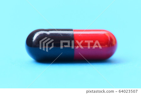 Capsule pill selective focus- Close up of color 64023507