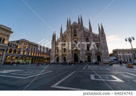 Duomo di Milan , the most famous gothic white marble cathedral church of Milan, in the morning, Italy 64024743