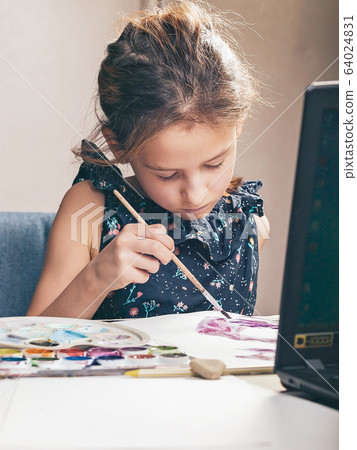 Cute girl draws with paints. Ideas for activities Cute girl draws with paints. Ideas for activities 64024831