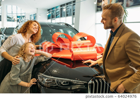 woman and child look at their father with love woman and child look at their father with love 64024976