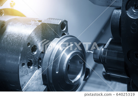 The CNC lathe machine in metal working process. 64025319