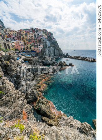 Italian coastline and colorful Manarola village in Cinque Terre, Italy 64025670