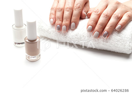 Manicured woman hands 64026286