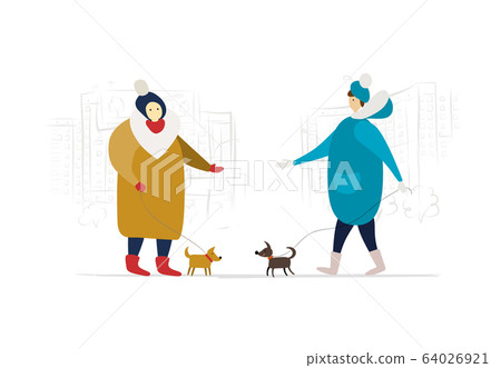 Housemates walk with dogs near the house. Winter season 64026921