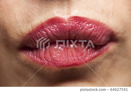 Beautiful sexy red lips giving kiss Beautiful sexy red lips giving kiss 64027591