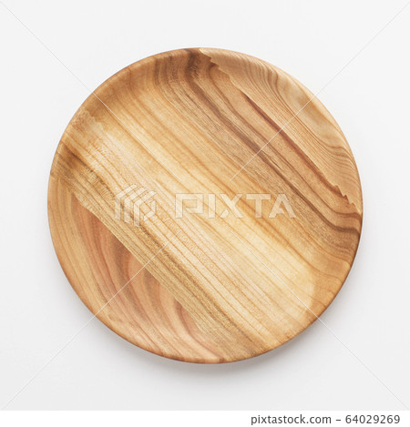 Wooden plate on white background, close up 64029269