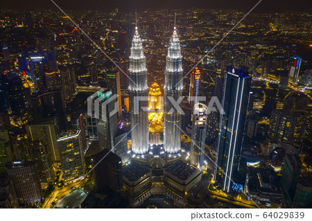 Aerial view of Kuala Lumpur city center skyline at night 64029839