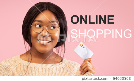 Online shopping during COVID-19 outbreak. African American girl with credit card on pink background, collage Online shopping during COVID-19 outbreak. African American girl with credit card on pink background, collage 64030508