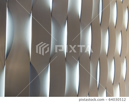 View on abstract wall with backlights in urban cafe interior View on abstract wall with backlights in urban cafe interior 64030512