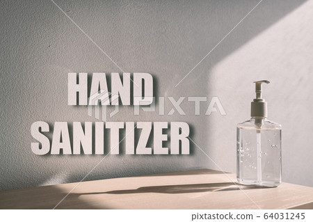 Hand sanitizer billboard sign for COVID-19 coronavirus prevention - proper measures to keep clean hands with alcohol gel rub hand sanitiser background Hand sanitizer billboard sign for COVID-19 coronavirus prevention - proper measures to keep clean hands with alcohol gel rub hand sanitiser background 64031245