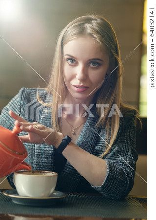 woman with teapot woman with teapot 64032141