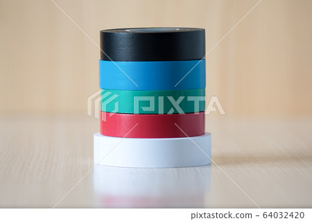 Four colorful insulating tapes to insulate twisted of electrical wires. Four colorful insulating tapes to insulate twisted of electrical wires. 64032420