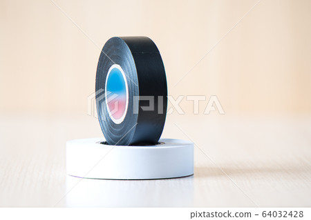 Black and white insulating tapes to insulate twisted of electrical wires. Black and white insulating tapes to insulate twisted of electrical wires. 64032428