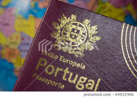 Portuguese international European Union foreign passport. On the background of the earth. Customs concept. Portuguese international European Union foreign passport. On the background of the earth. Customs concept. 64032466