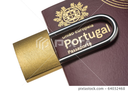 Portuguese international European, European Union foreign passport. The padlock is closed, a symbol of the travel ban. Border customs concept. Portuguese international European, European Union foreign passport. The padlock is closed, a symbol of the travel ban. Border customs concept. 64032468